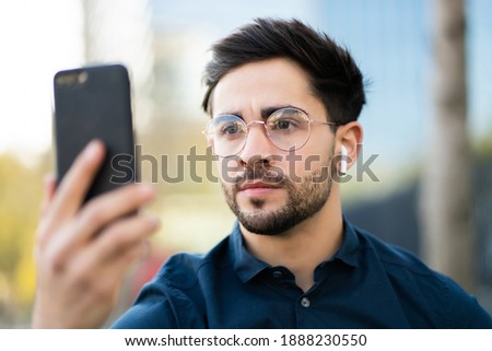 Similar – Image, Stock Photo Face recognition of young woman in the crowd