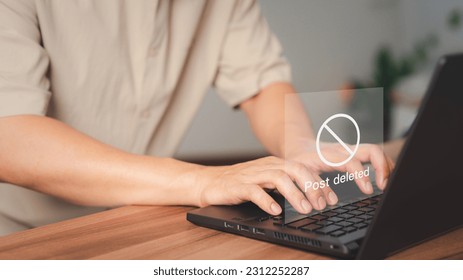 Young man using a laptop to play social media, but the post has been deleted. Searching for more internet, search engine optimization