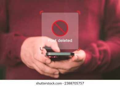 Young man using a mobile phone to play social media on a website, but the post has been deleted. Searching for more internet, search engine optimization.