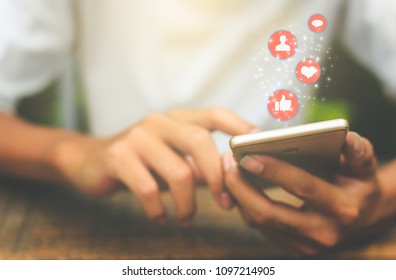 Young Man Using Smart Phone,Social Media Concept / Tone Color Red
