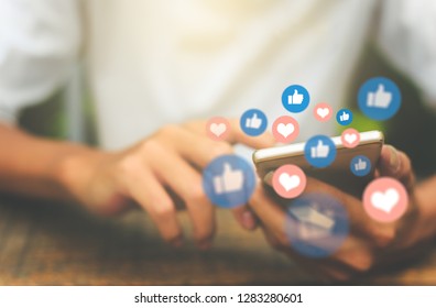 Young man using smart phone,Social media concept. - Shutterstock ID 1283280601