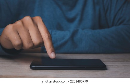 Young man using smartphone. Hand holding mobile texting message contact us.chatting,search internet information. Technology device communication connecting. - Shutterstock ID 2231485779