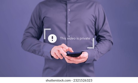 Young man using a smartphone to play social media but this video is blocked or privacy settings have been set. Searching for more internet, and search engine optimization. Subscribing and following.