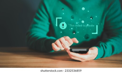 Young man using a smartphone to play social media but this video is blocked or privacy settings have been set. Searching for more internet, and search engine optimization. Subscribing and following.