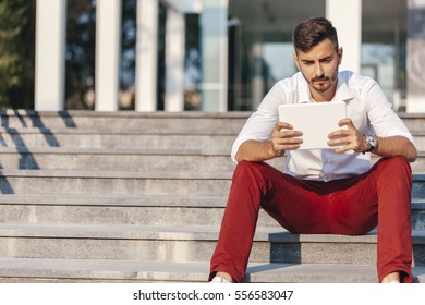 Young Man Using A Tablet