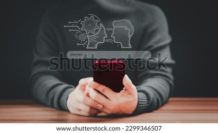 Young man using technology smart robot Ai by enter prompt for generates something that we want, Futuristic technology transformation. Ai Chatbot.