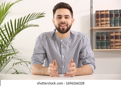 Young Man Using Video Chat At Home, View From Web Camera