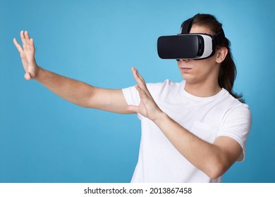 Young man using virtual reality headset. gadgets