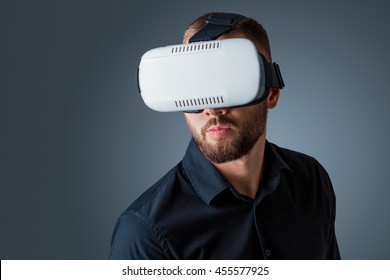 young man using a VR headset glasses