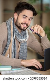 Young Man Vaping At Home