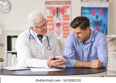 Young Man Visiting Urologist In Clinic