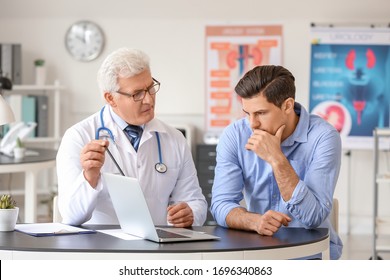 Young Man Visiting Urologist In Clinic