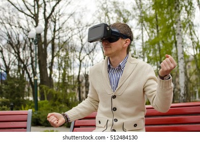 Young man in visual glasses is posing