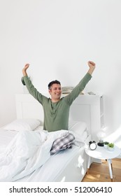 Young Man Waking Up Fully Rested