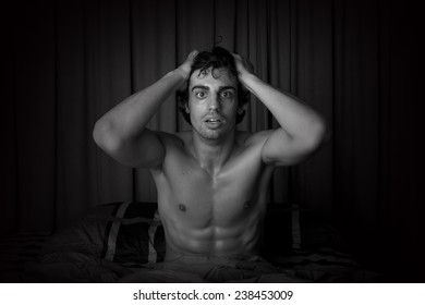 Young Man Waking Up From Nightmare