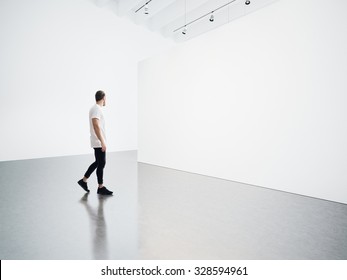 Young Man Walking In The Empty, White Gallery