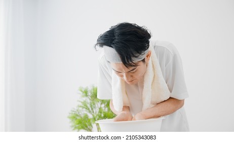 Young Man Washing His Face Beauty Image