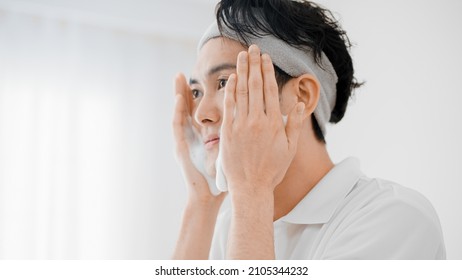 Young Man Washing His Face Beauty Image	
