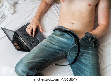 Young man is watching pornography and masturbating.