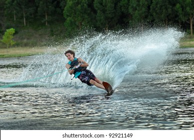 young man water skiing