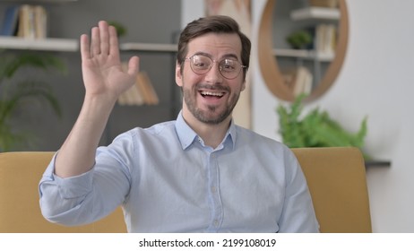 Young Man Waving Hand Fo Video Call