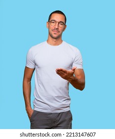 Young Man Waving With His Hand