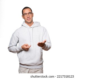 Young Man Waving With His Hand