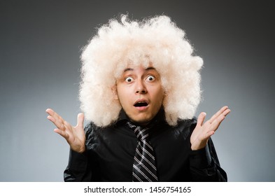 Young Man Wearing Afro Wig