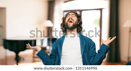 young man wearing bathrobe night suit victory sign