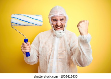 Young Man Wearing Painter Equipment Holding Stock Photo 1490011595