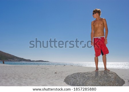 Similar – Image, Stock Photo Young man standing in sunlight in Iranian mosque