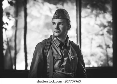 Young Man Wearing Red Army Form Outdoors, Retro Photo Effect