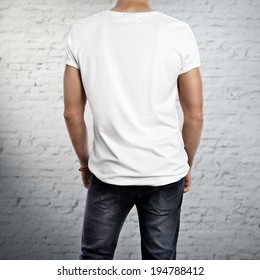 Young Man Wearing White T-shirt. Back.