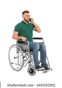 Young Man In Wheelchair Talking By Mobile Phone Isolated On White