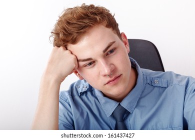 Young man while thinking