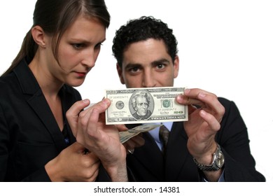 young man and woman holding cash