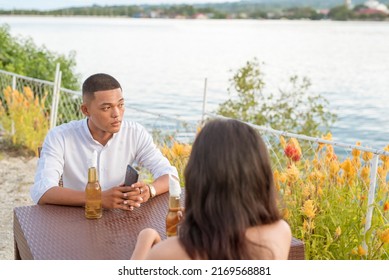 A Young Man And Woman On A Rocky First Date Going Poorly, With Awkward Silence And Blank Stares. Lack Of Chemistry And An Uncomfortable Situation Between The Two.