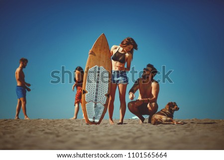 Similar – Beautiful women having fun in a surf class