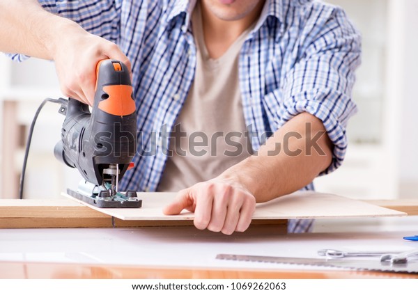Young Man Woodworking Hobby Concept Stock Photo Edit Now 1069262063