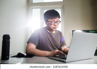 young man working with computer