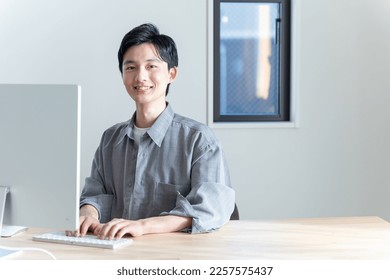 Young man working with a computer
