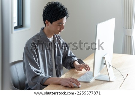 Young man working with a computer