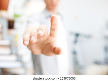 Young Man Working With Virtual Screen Or Pushing Button