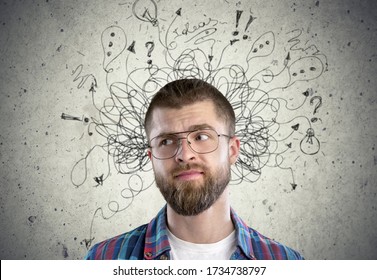 Young man with worried stressed face expression with illustration - Shutterstock ID 1734738797