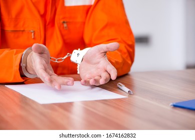 Young Man Writing Letter In Provisional Detention