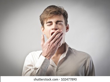 Young Man Yawning