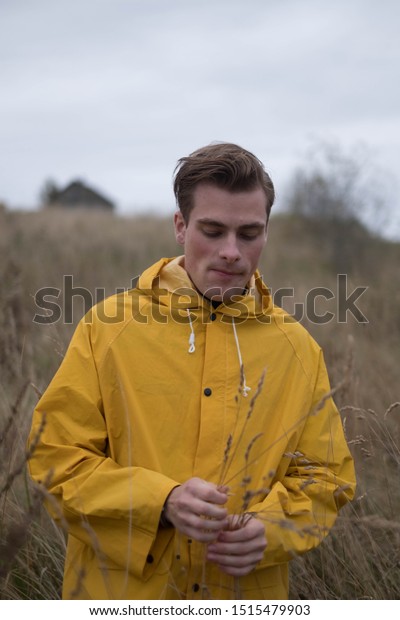 yellow raincoat man