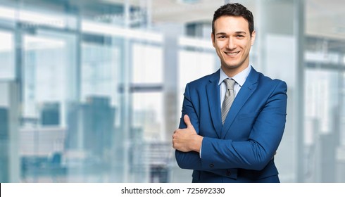 Young Manager Smiling In A Modern Office