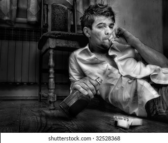 Young Man,drunkard Sitting In Old Room