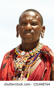 Young Massai Man Is Posing On Beach